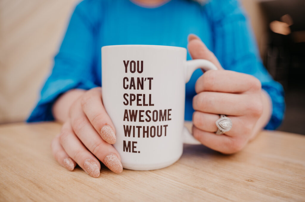 white mug that says: "you can't spell awesome without me"