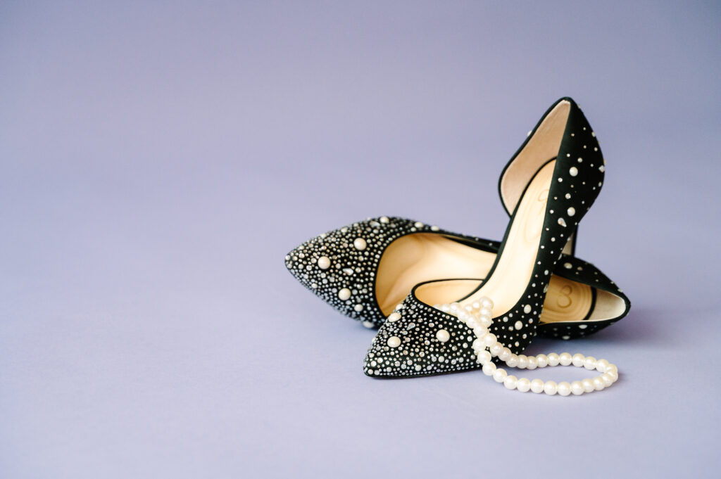 Posed shoes for brand photoshoot in Iowa studio